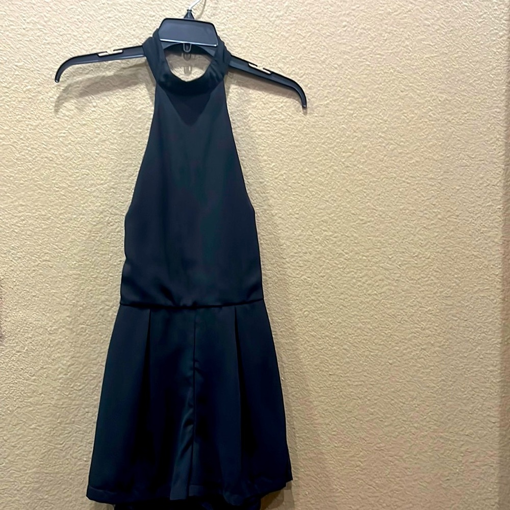 Small black halter romper with low back